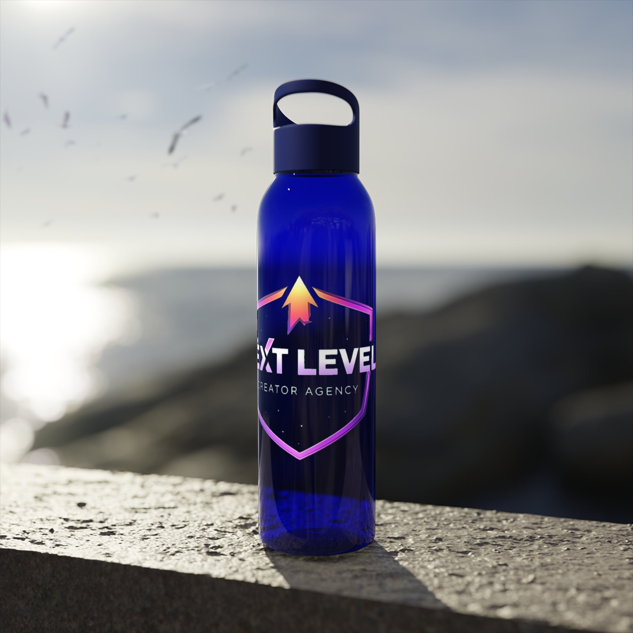 Sky Water Bottle — Clear Bottle with Gradient Arrow Logo (Next Level Creator Agency)